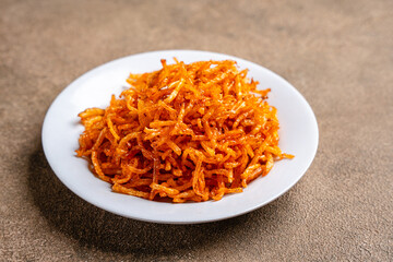Dried potato or potato mustofa (indonesian : Kering Kentang Potato Balado) is the term for dry match-shaped potatoes stir-fried with Indonesian spices.