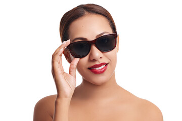 Loving her new shades. Studio shot of a young woman wearing sunglasses posing against a white background.