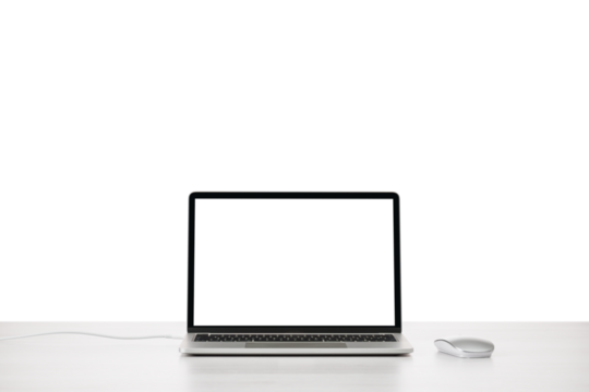 Modern laptop on office table with mouse with blank screen.PNG image