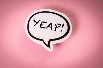 Yeap. White speech bubble with text on pink background