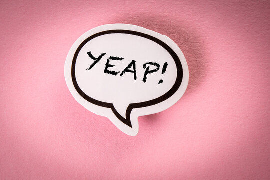 Yeap. White speech bubble with text on pink background
