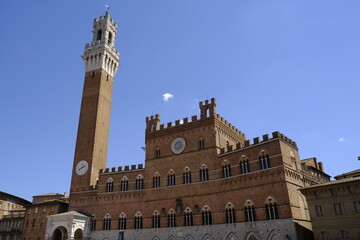 Fototapeta premium Palazzo Pubblico in the Piazza del Campo, Siena, Tuscany, Italy. The square of the famous Palio di Siena.