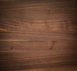 Old wood background. Dark tone walnut plank tabletop texture background. Wood planks desktop background.
