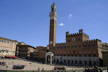 Fototapeta na wymiar Palazzo Pubblico in the Piazza del Campo, Siena, Tuscany, Italy. The square of the famous Palio di Siena.