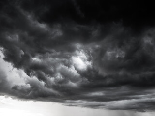 dark clouds make sky in black. Heavy rain thunderstorm. Pattern of clouds overcast predict tornado, Hurricane or thunderstorm and rainy. Dark sky cloudy have storm and lightning thunderbolt.