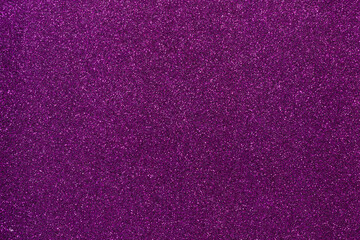Abstract background filled with purple gold glitter