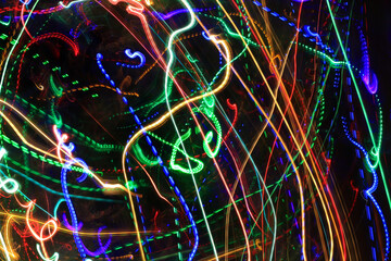 Abstract blurry background from colorful traces of lights