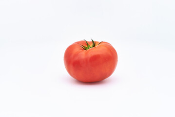 A tomato on a white background
