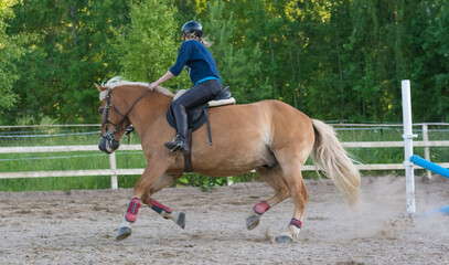 Woman horseback riding 