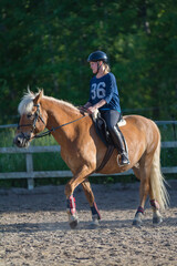 Obraz premium Woman horseback riding 