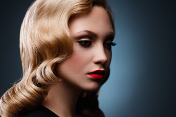 Fototapeta premium Young elegant blond woman fashion portrait with makeup