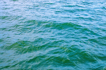 sea waves of emerald color, background texture