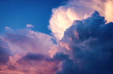 thundercloud, in the rays of the sun, colorful beautiful sky background