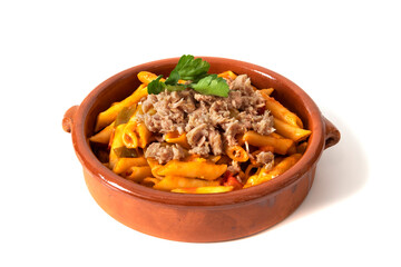Macaroni pasta with tuna in tomato sauce, served in a clay bowl. Isolated on a white background. Italian food concept.