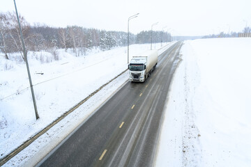 A semi-trailer truck, semitruck, tractor unit and semi-trailer to carry freight.
