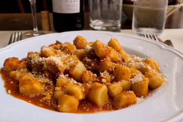 gnocchi with meat and tomatoes a typical roman's plate