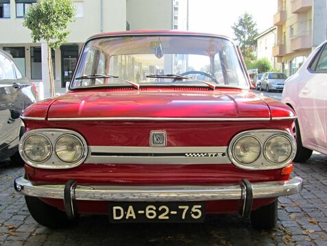 Front of a red NSU TT vintage car 