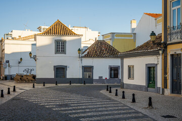 Historic street in Faro with traditional Portuguese architecture, Algarve, Portugal