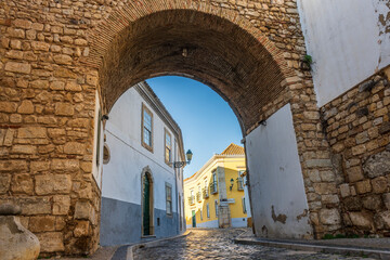 Resting Arch in medieval walls is one of 4 entrances to the old town in Faro, Algarve, Portugal