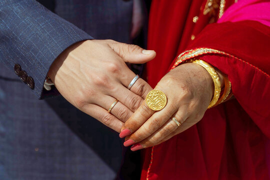 Nepali wedding,  A Couple wedding day, close up hand, lovely touched 