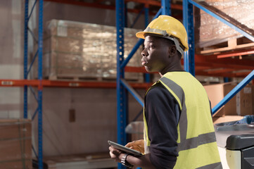 Portrait of warehouse workers in a large warehouse with their own preparation for the day's work