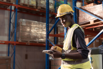 Portrait of warehouse workers in a large warehouse with their own preparation for the day's work