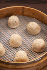 Steamed pork soup dumplings named Xiao long bao in Taiwan.