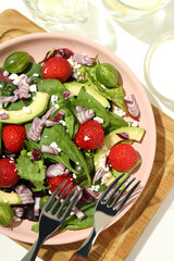 Concept of tasty salad, salad with strawberry, top view
