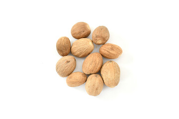 Organic Nutmeg whole on white background stock images. top view