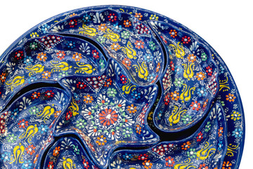 Classical traditional Turkish ceramics, handmade colorful dish, isolated at white background. Istanbul, Turkey souvenirs. Selected focus, copy space