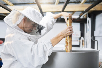 Beekeeping, process and beekeeper with honeycomb manufacturing, sustainability and factory storage....