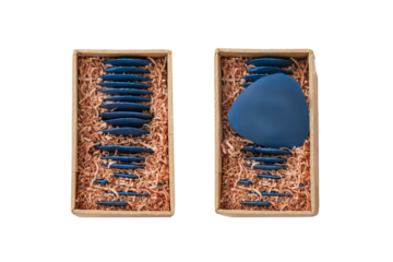 Old blue chalk of tailor in paper box with transparent background