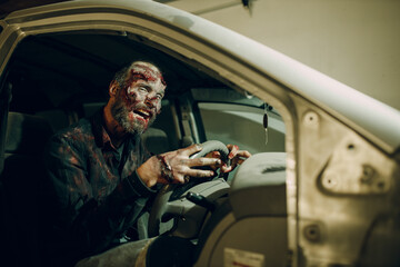 Zombie driving car to halloween party concept. Make up skin and blood face