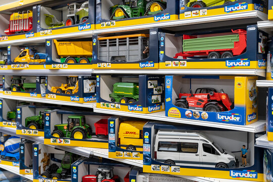 Construction equipment toys from Bruder brand on the store shelf. Minsk, Belarus, 2023