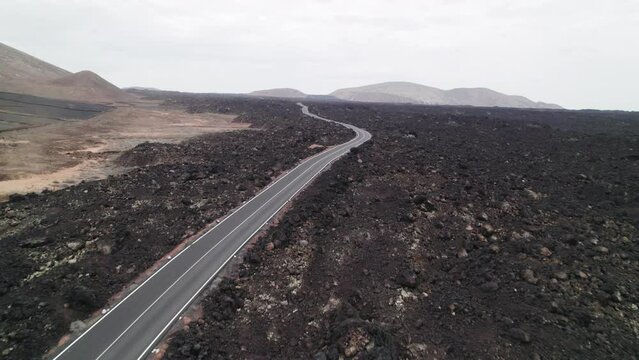 Aerial Casacoral Road with little Tornado, near Pueblo Tenesar in Lanzarote, Canary Islands