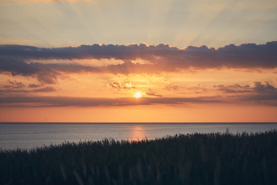 Sun setting at the north sea in Denmark. High quality photo