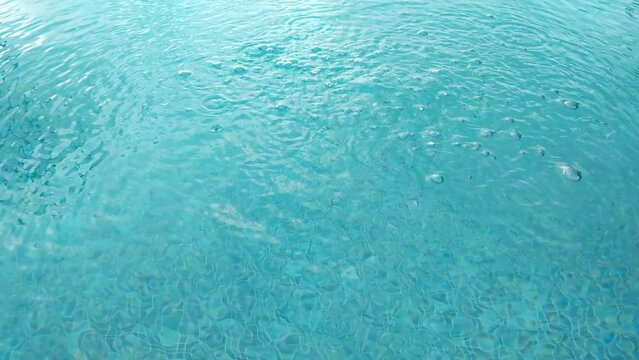 Air bubbles in pool water. Rest, relaxation in the water. Flow of oxygen bubbles