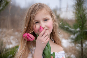 girl with flowers. holiday, congratulations on the holiday of spring, birthday