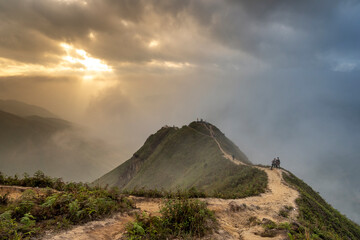 The majestic panoramic image of Ta Xua mountain. Visitors can experience on the trail like the back...