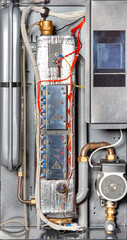 Internal view of an electric boiler with a Wi-Fi module for remote control via the Internet.