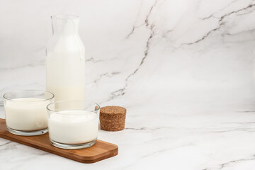 lactose free yogurt, kefir, fermented milk on a light background. Healthy, clean eating. Vegan or gluten free diet