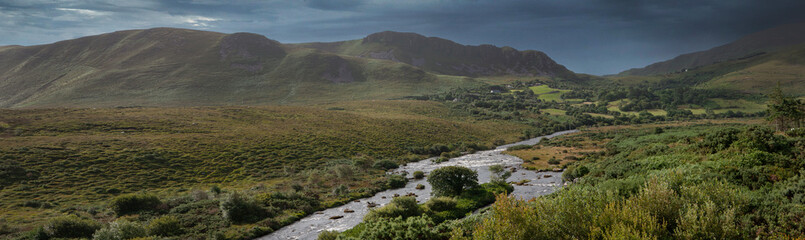 Fototapeta na wymiar ireland, ring of Kerry, westcoast, mystical landscapes, valley, clouds, river, panorama, 