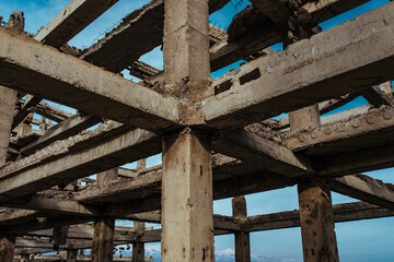 Abandoned concrete structure on blue sky background