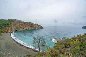 the scenic route of lycian trail, between Tekirova and Çıralı is full of amazing bays and beaches with forest and mountains.