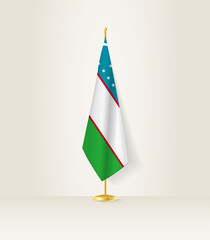 Uzbekistan flag on a flag stand.