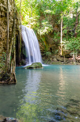 Fototapeta na wymiar Erawan Waterfall at Erawan national park in Kanchanaburi, Thailand