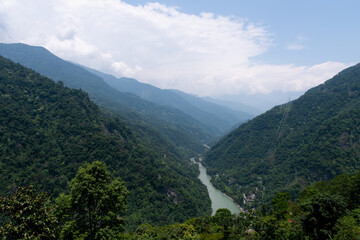River Teesta flowing in the valley towards a dam, Sikkim, India