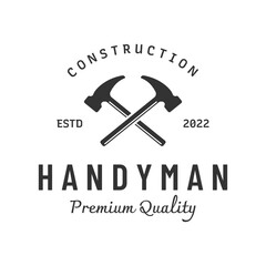 Crossed hammer logo template design for vintage work carpentry tools.Logo for handyman, repair, construction.