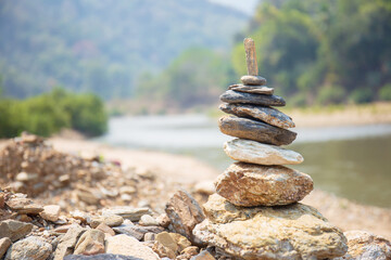 The stone is stacked on the edge of the river.