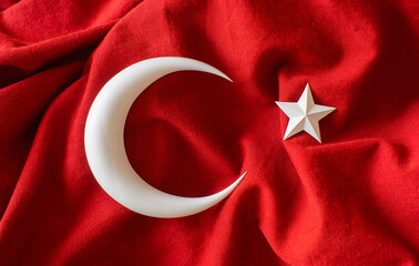 Turkish flag, 3d moon and star on red fabric
